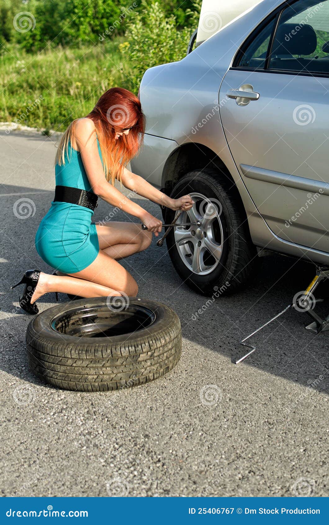 Girl is Trying To Change a Tire Stock Image Image of race, service