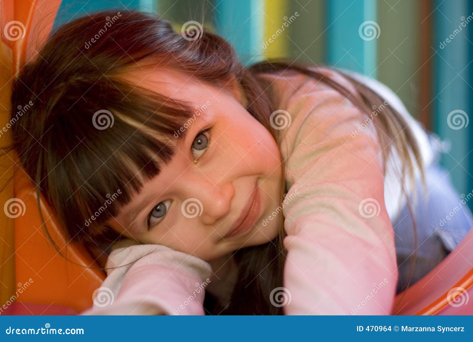 girl in tunel on playground