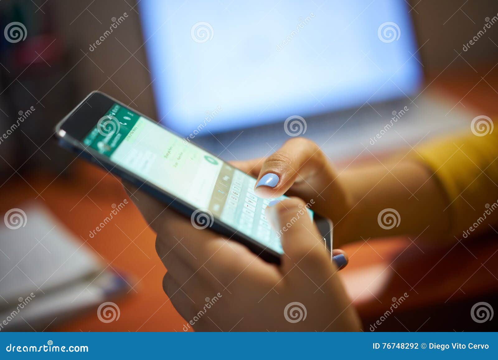 girl typing phone message on social network at night
