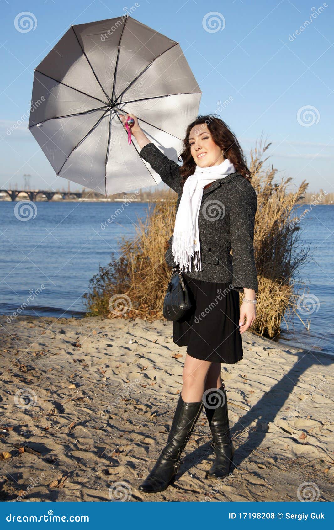 Girl with the umbrella. stock photo. Image of sand, female 17198208