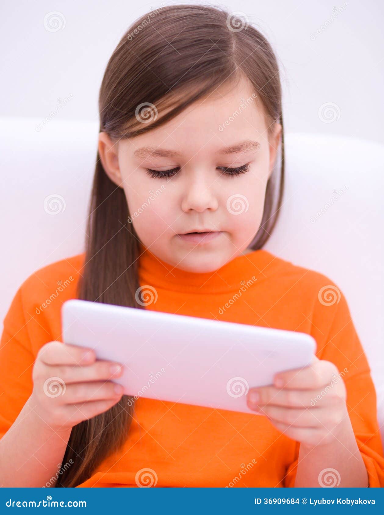 Girl using tablet stock photo. Image of holding, news 36909684