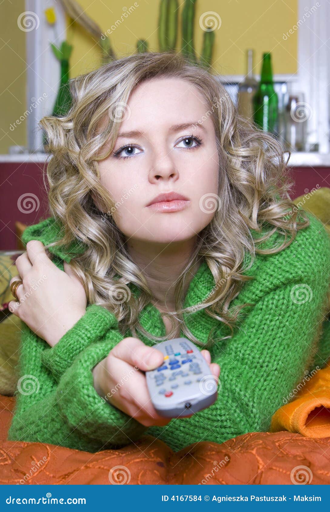 Girl is watching tv stock photo. Image of entertainment - 4167584