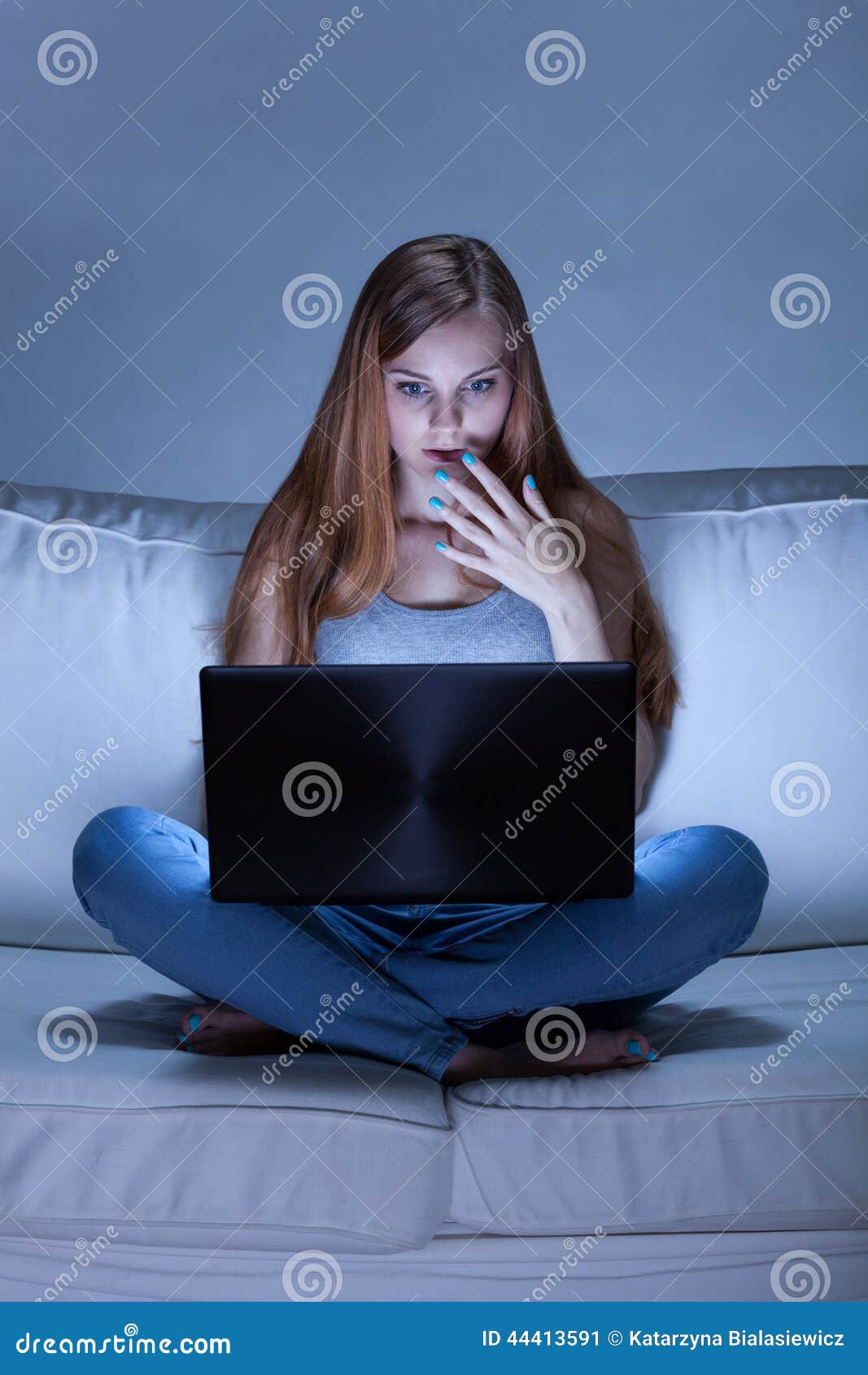 Girl Watching Video on the Stock Image Image of settee, online 44413591