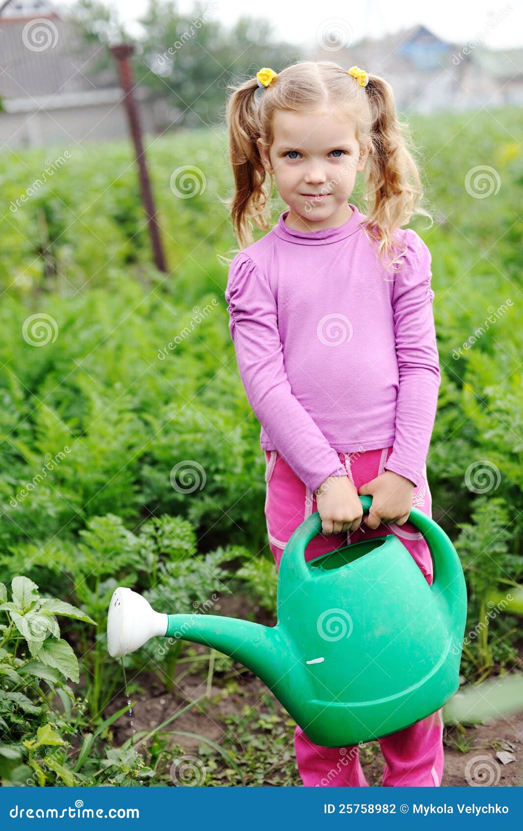 Girl with a water can stock photo. Image of hobby, child 25758982