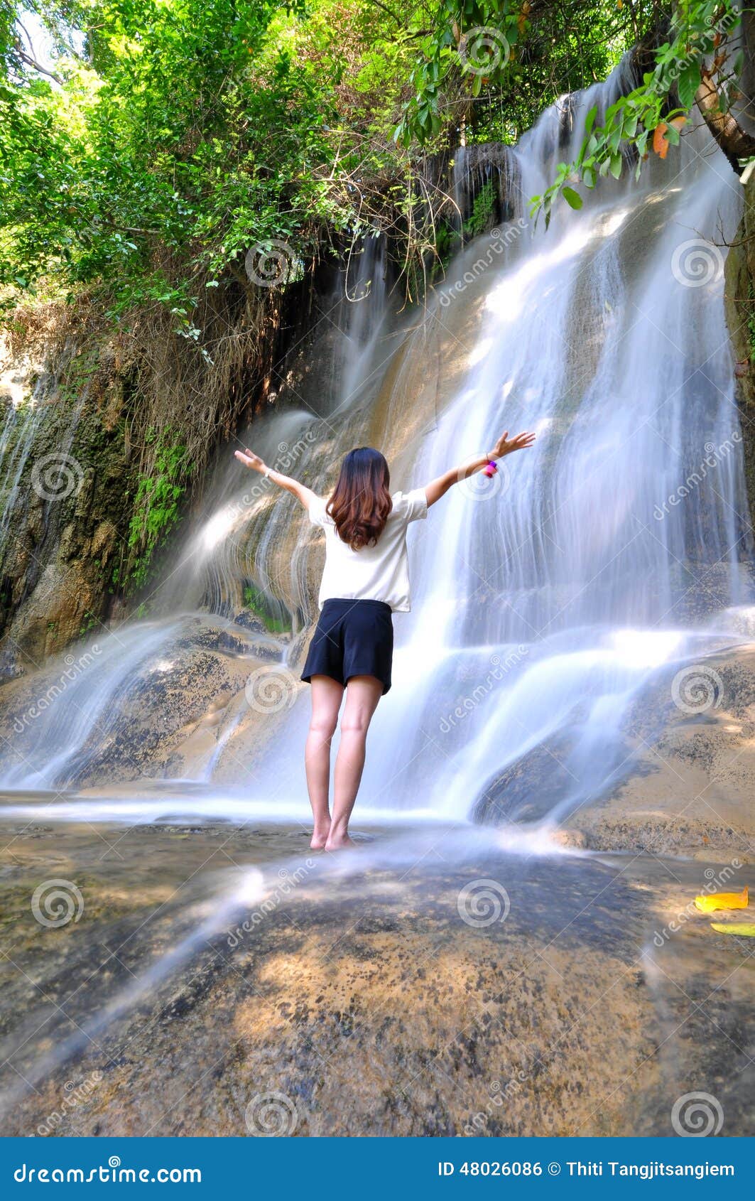 Girl with Water fall stock photo. Image of kanchanaburi - 48026086