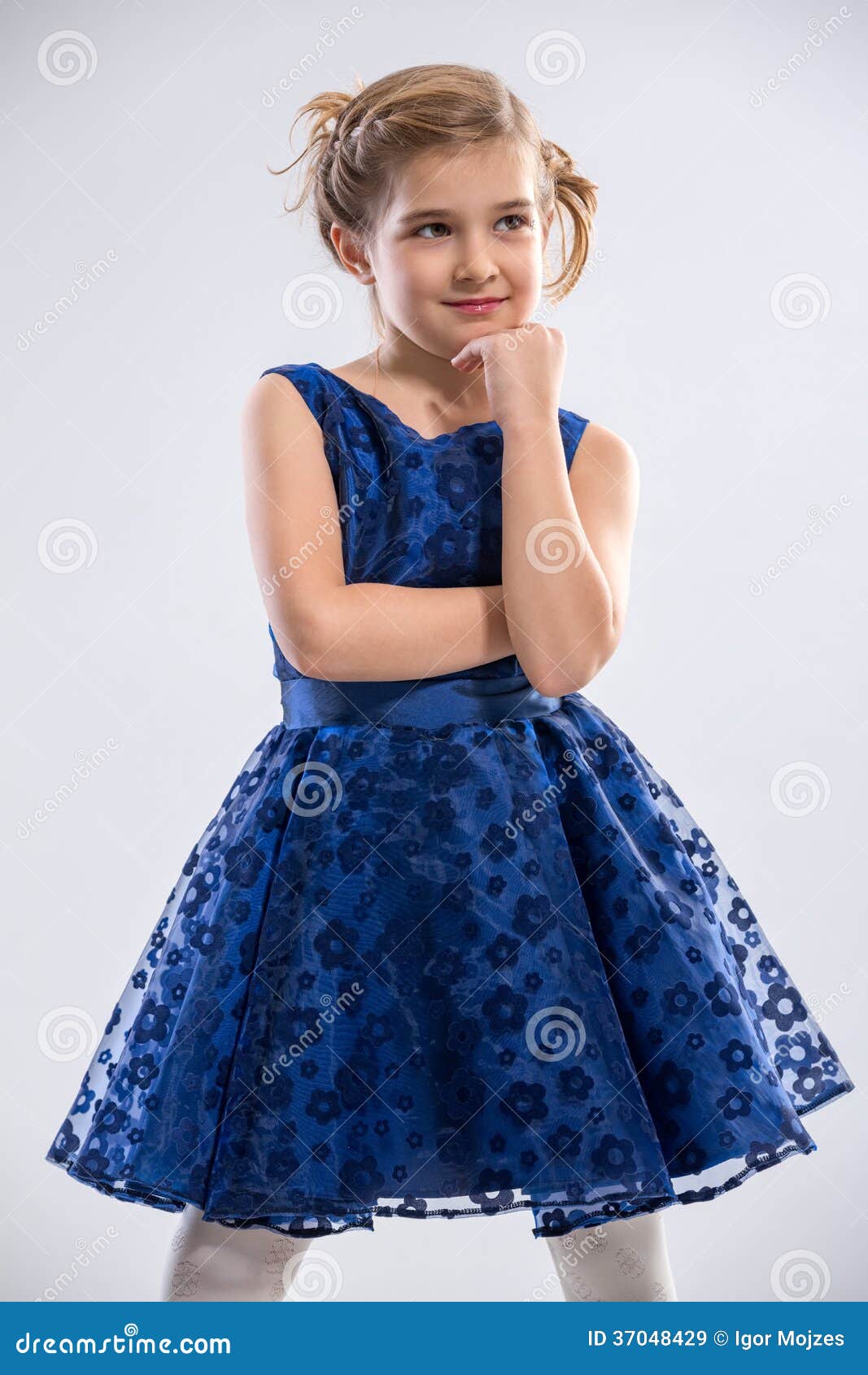 Girl wearing blue dress stock image ...