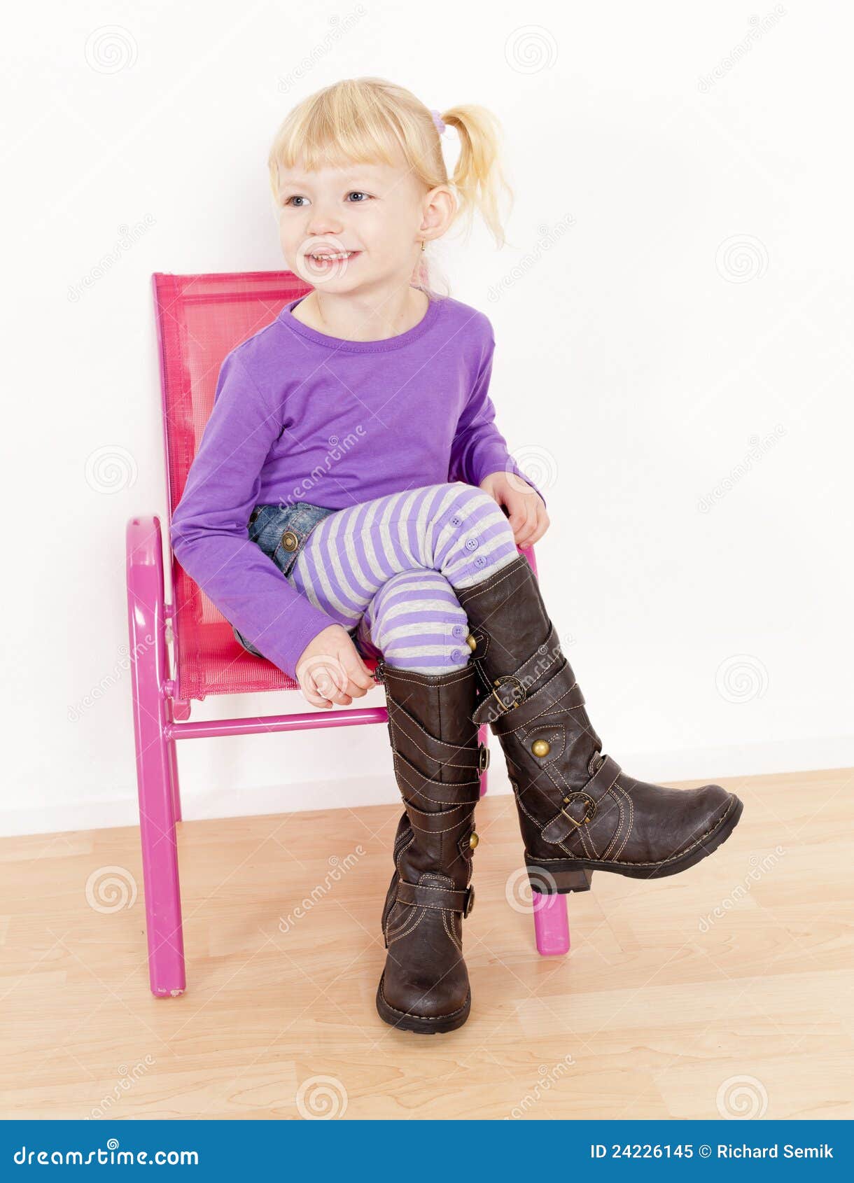 Girl wearing boots stock image. Image of young, smiling 24226145