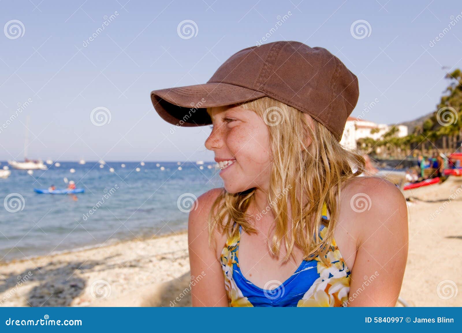 Girl wearing hat on beach stock image. Image of oceanfront 5840997