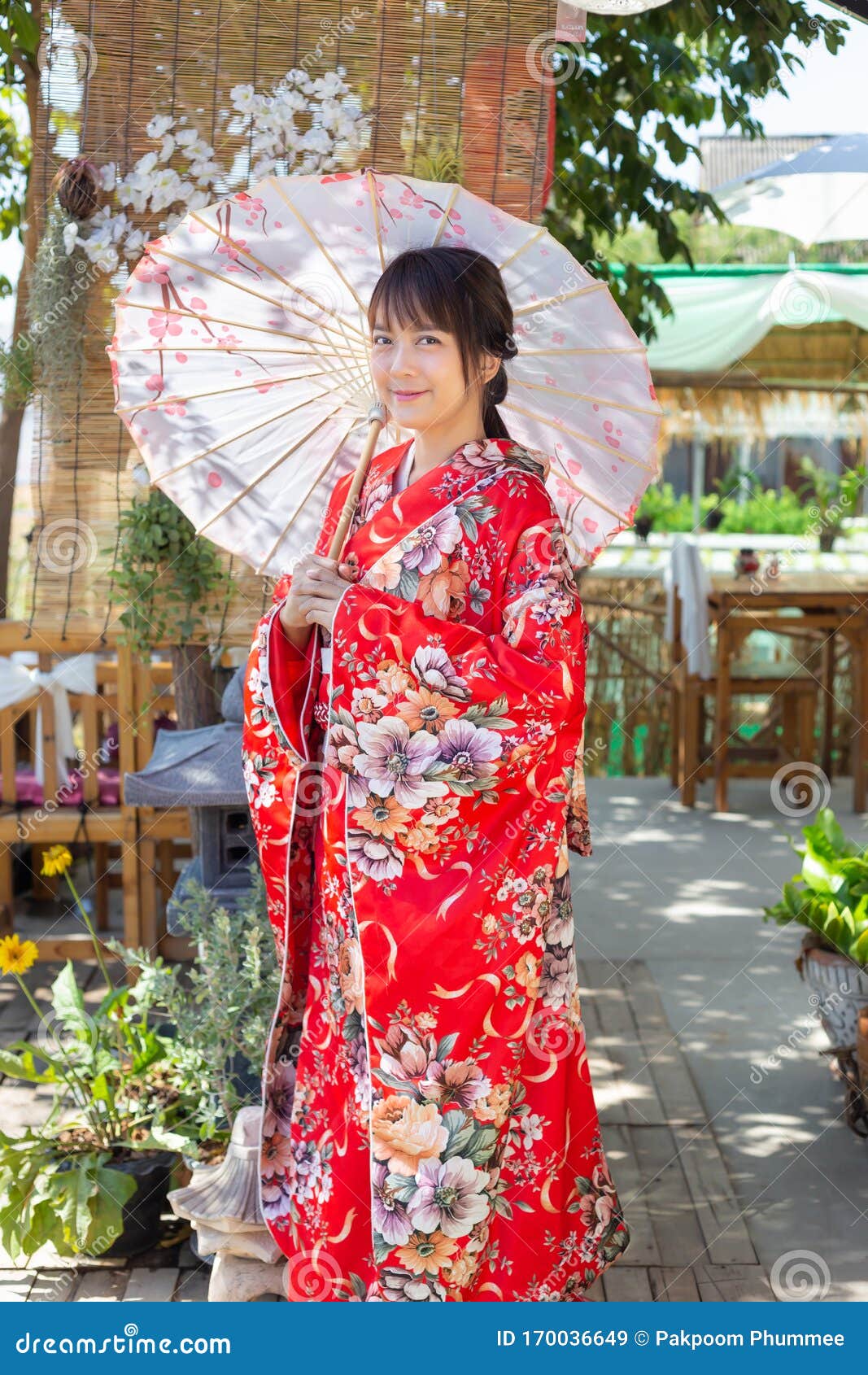 The Girl Is Wearing A Red Traditional Kimono Which Is The National Dress Of Japan Stock Image