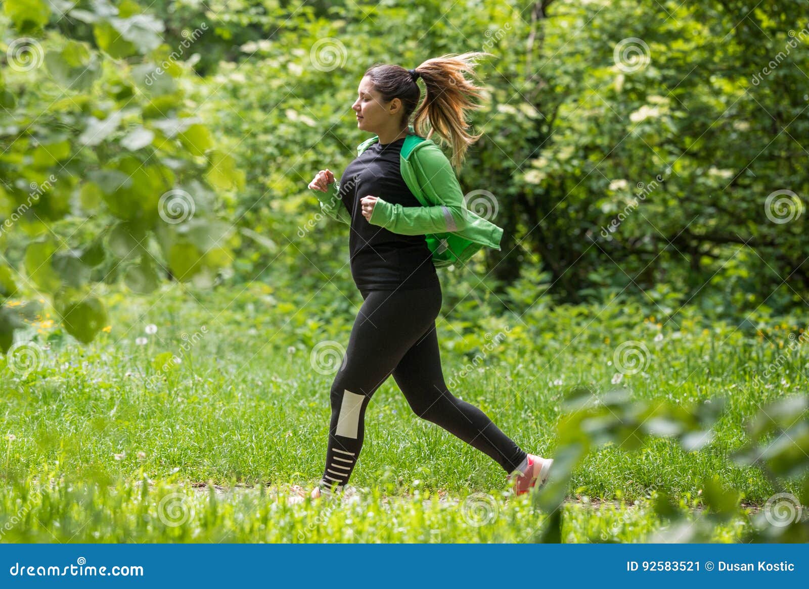 Girl Wearing Sportswear and Running in Forest at Mountain Stock Image ...