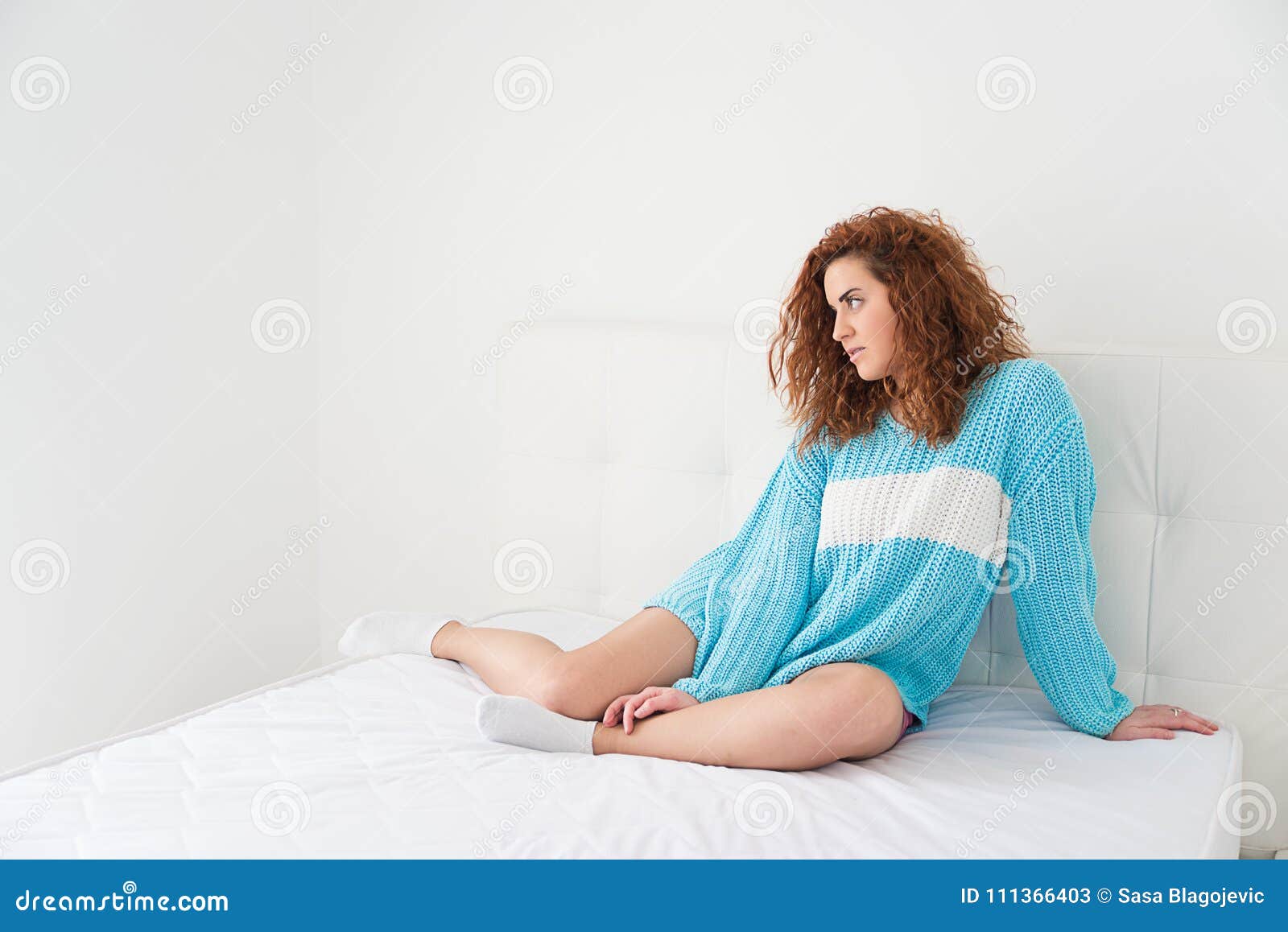 Girl on a white bed stock image. Image of resting, relax 111366403