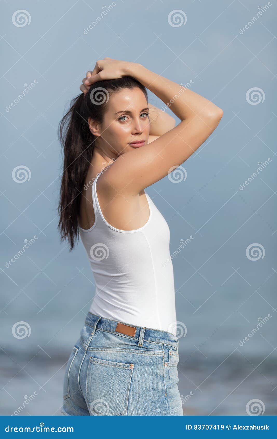 Woman White Tank Top Jean Shorts Stock Photos - Free & Royalty-Free Stock  Photos from Dreamstime