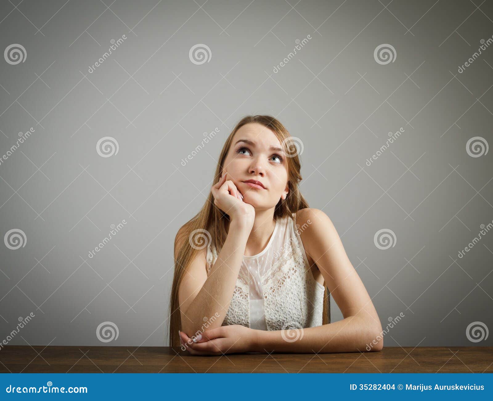 Girl in white is thinking stock photo. Image of concept - 35282404