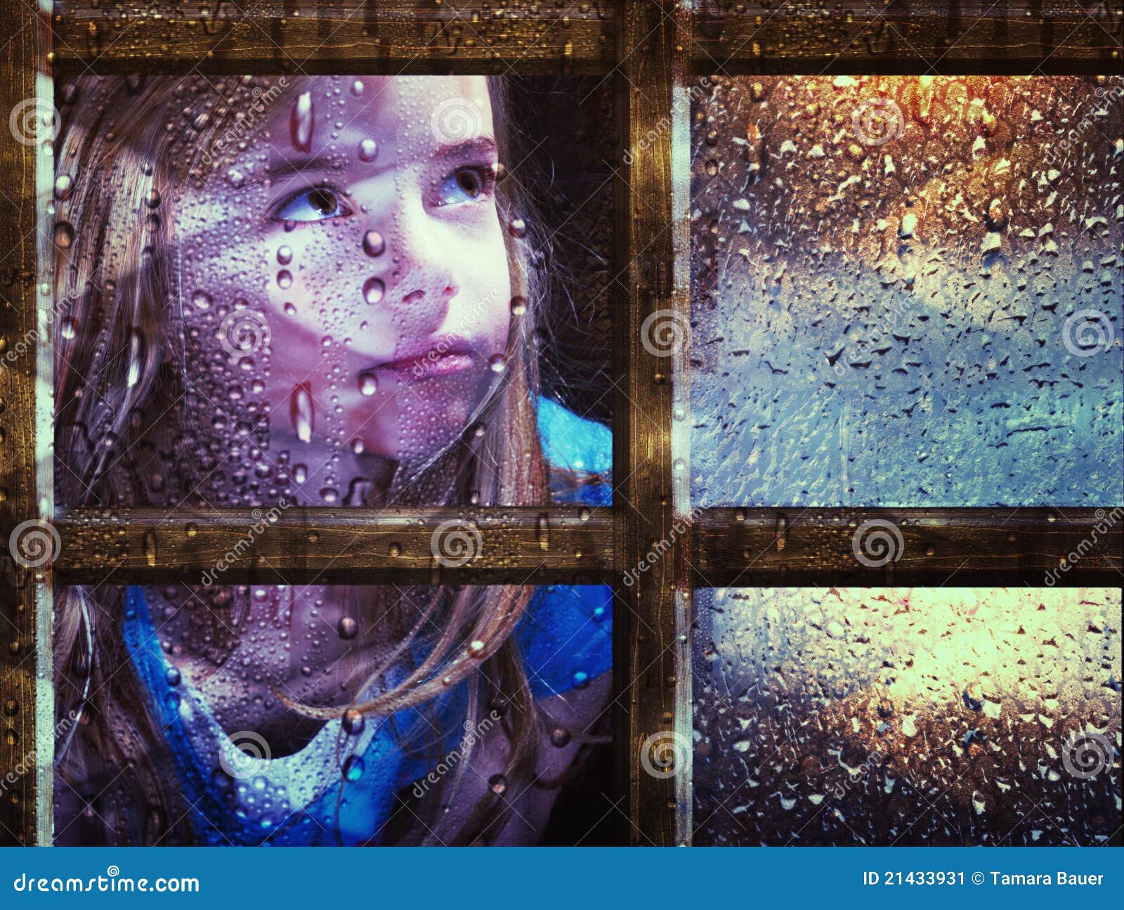 girl at window in rain