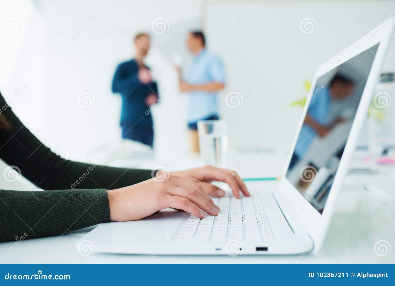 girl works on a laptop. concept of internet sharing and interconnection