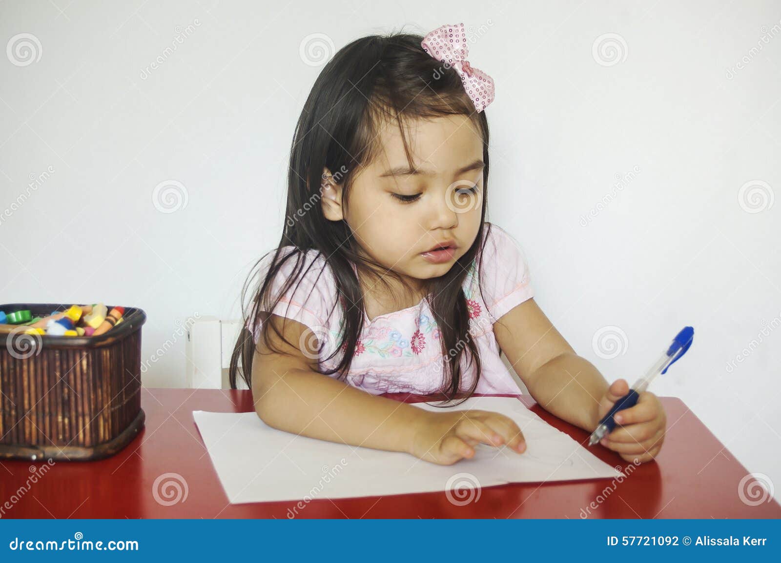 Girl writes on paper stock photo. Image of learn, left 57721092