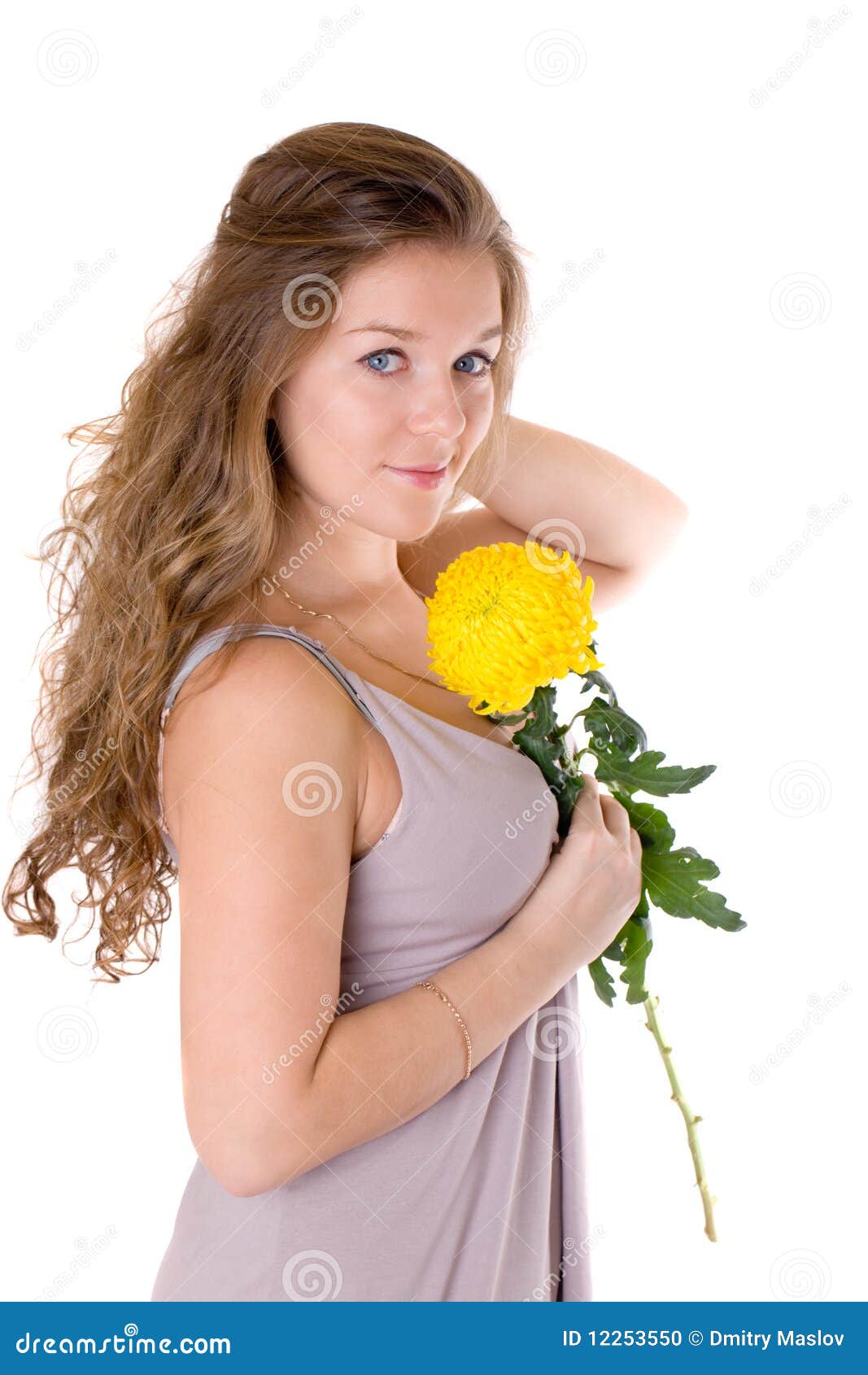 Girl with a yellow flower stock photo. Image of girls 12253550