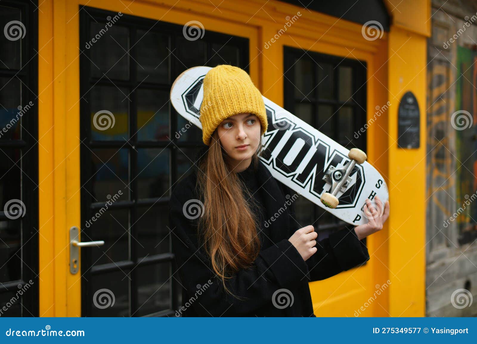 Girl in a Yellow Hat with a Skateboard Stock Image Image of cheerful