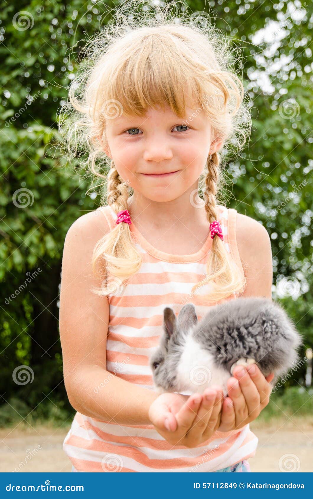 Girl with Young Bunny Rabbit Stock Image Image of happy, animal 57112849