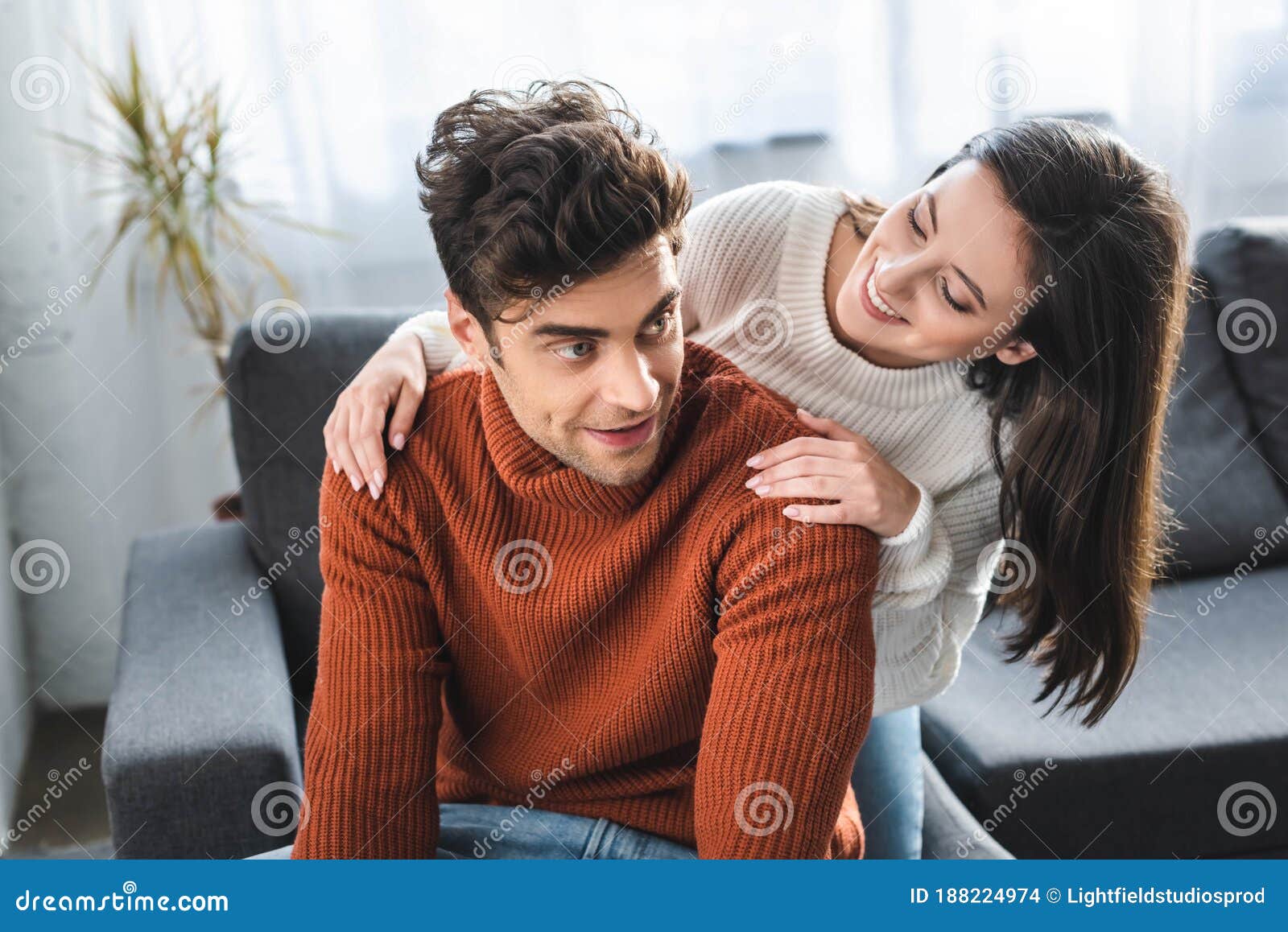 Girlfriend and Boyfriend in Sweaters Smiling and Hugging in Apartment Stock Photo Image of