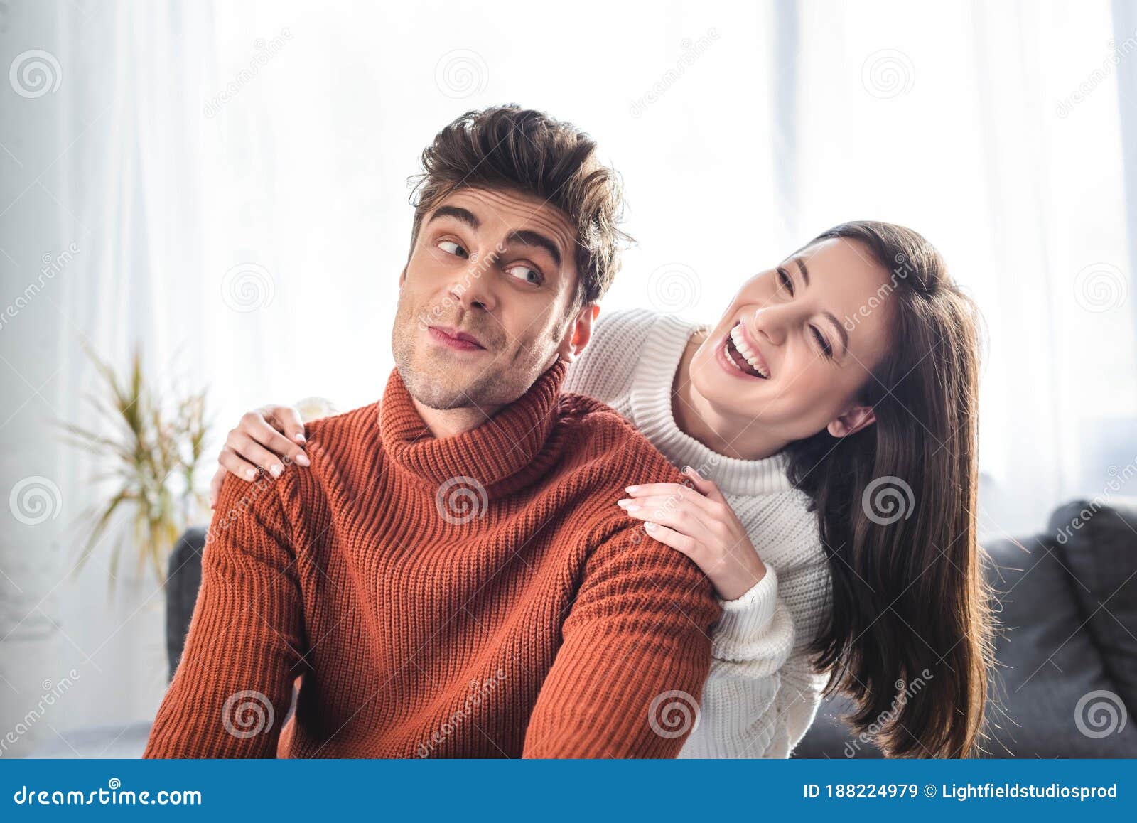 Girlfriend and Boyfriend in Sweaters Smiling and Hugging in Apartment Stock Image Image of