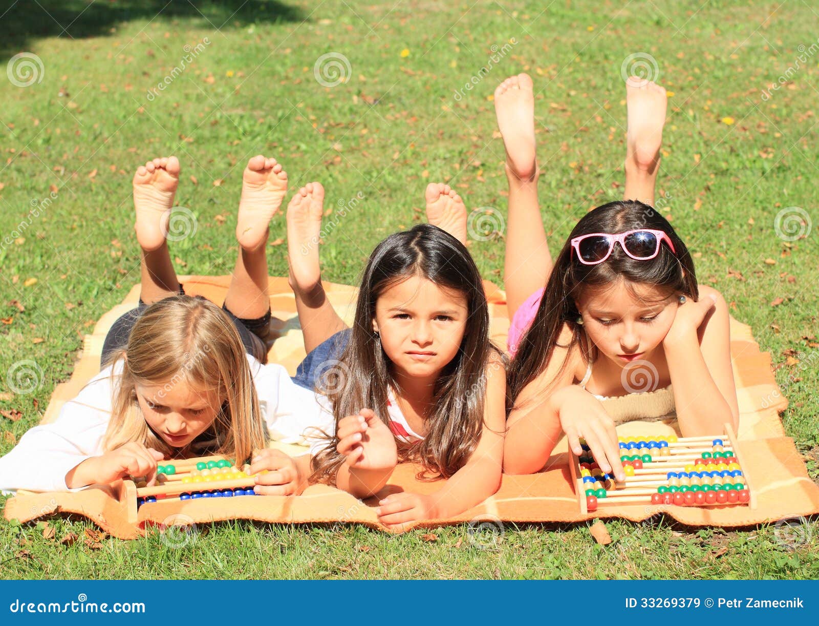 https://thumbs.dreamstime.com/z/girls-abacuses-three-lying-little-barefoot-girl-playing-two-colorful-33269379.jpg