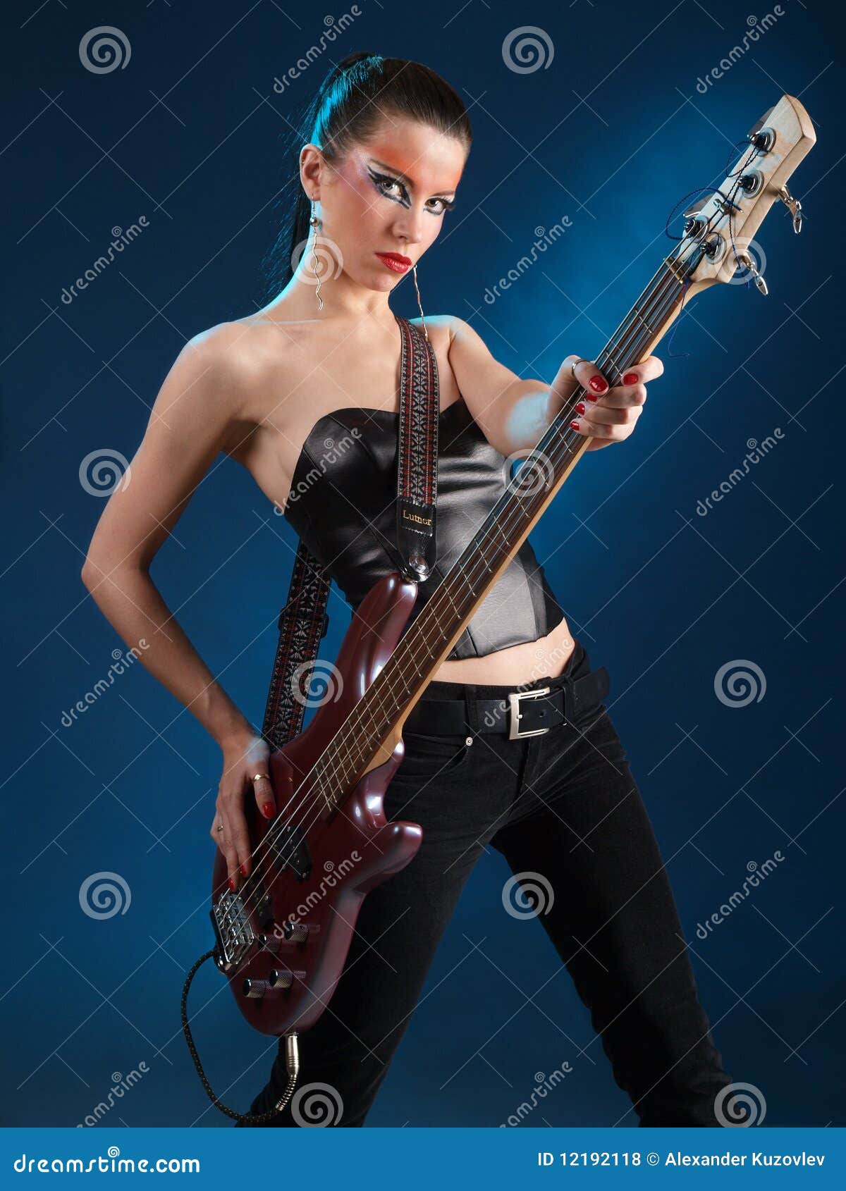 Girls with bass guitar stock photo. Image of indoors 12192118