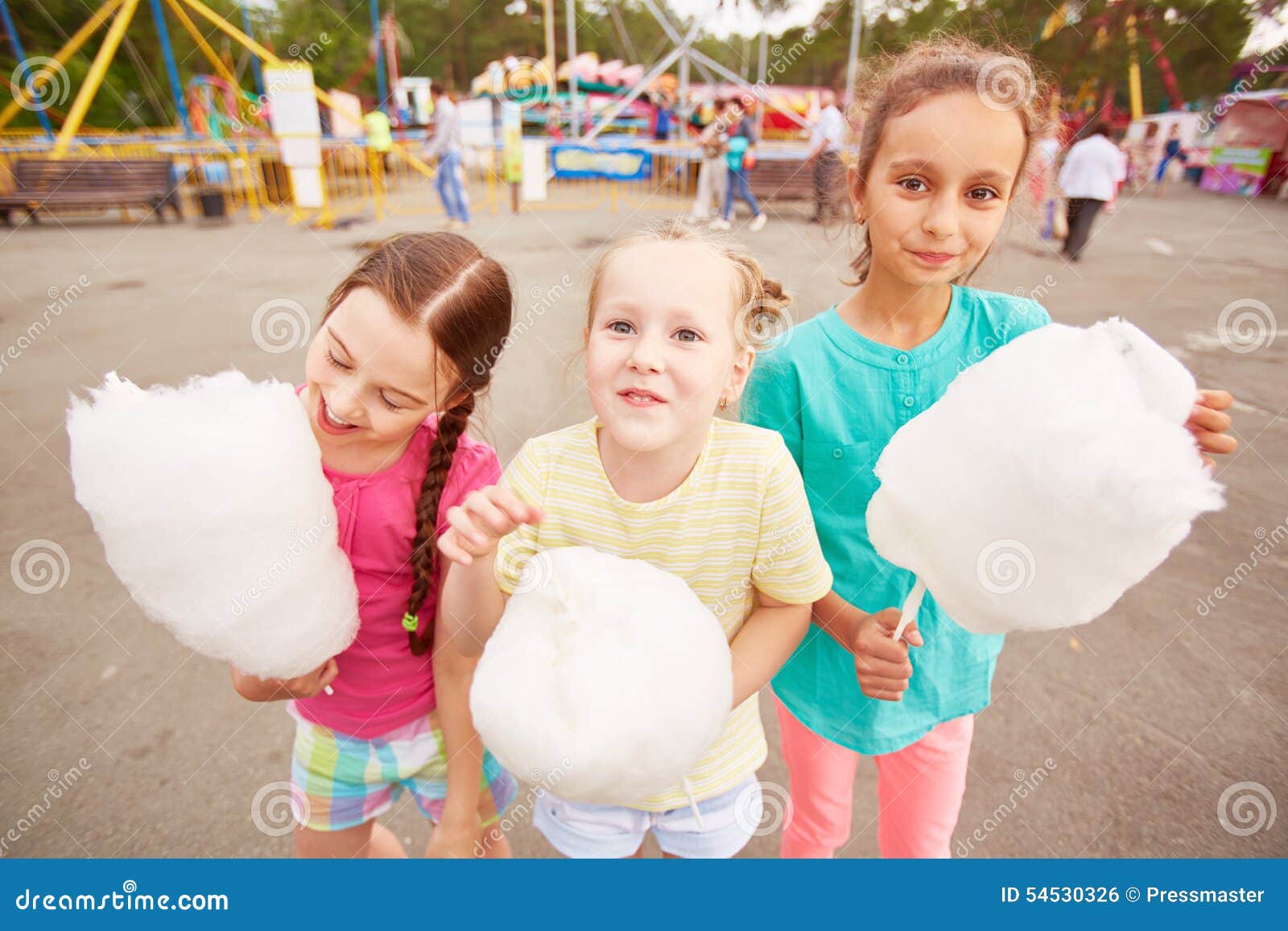 Girls with cotton candy stock photo. Image of youth, little 54530326