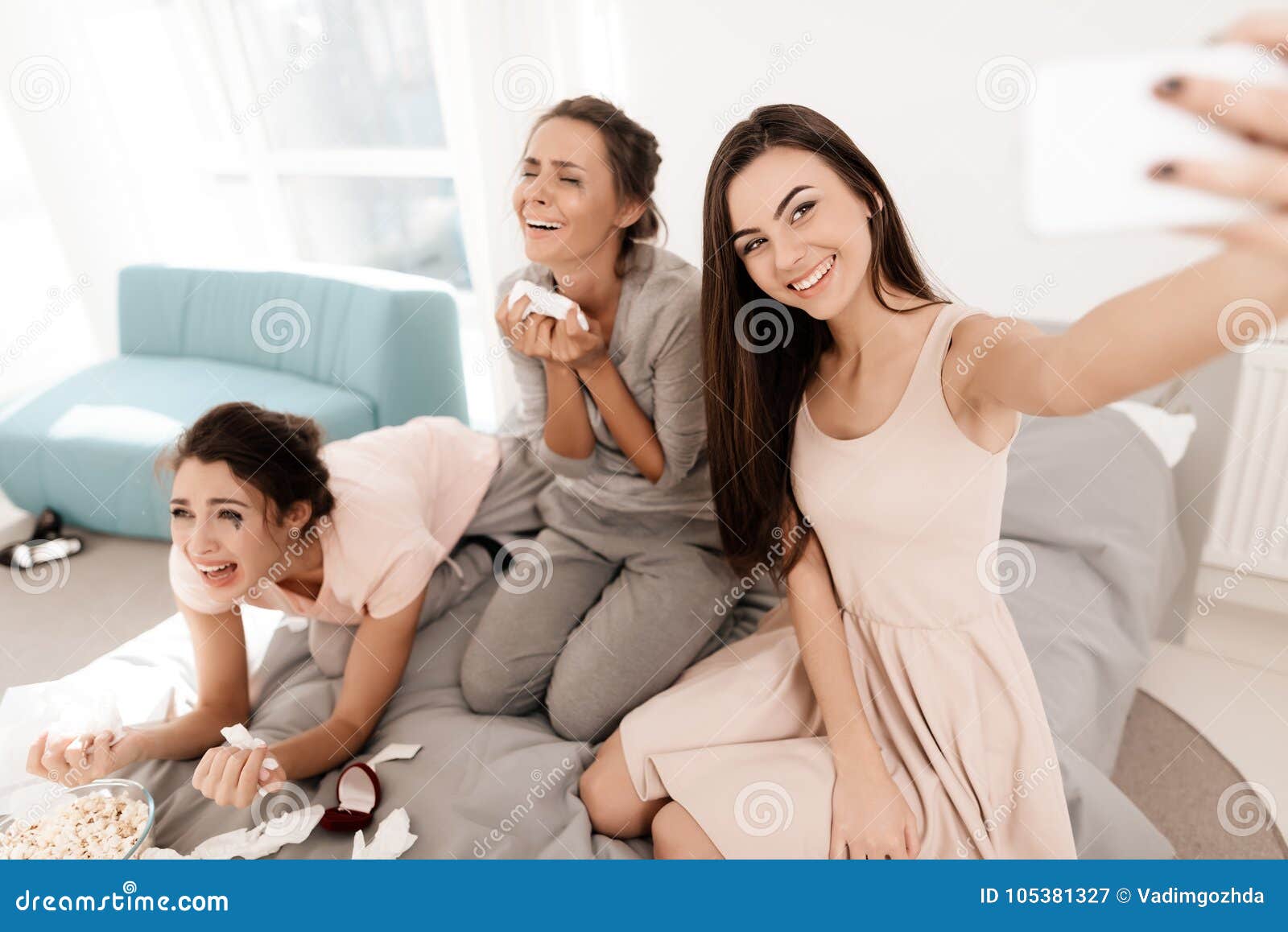 The Girls are Crying at the Hen-party. they are Sitting on the Bed in ...