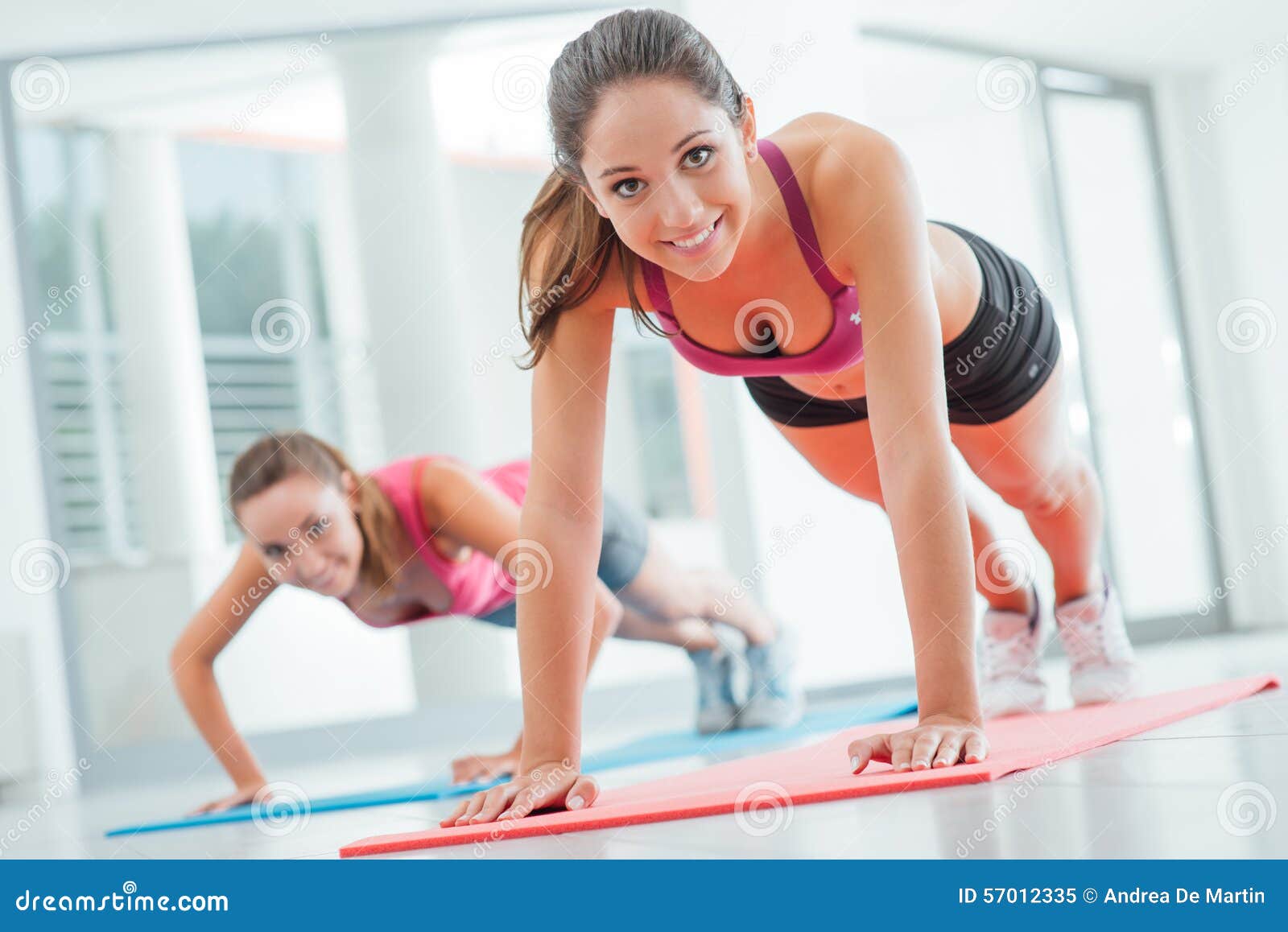 Girls Doing Push Ups at the Gym Stock Image - Image of push, beautiful:  57012335