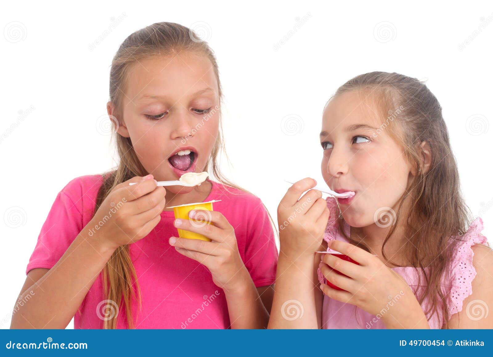 Girls eating yogurt stock photo. Image of girl, yogurt 49700454