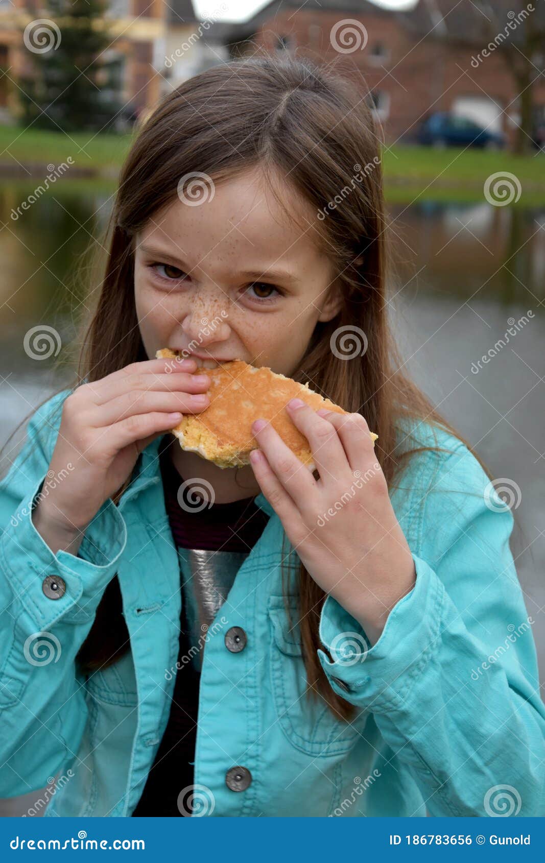 girl eats a slice of crumble cake