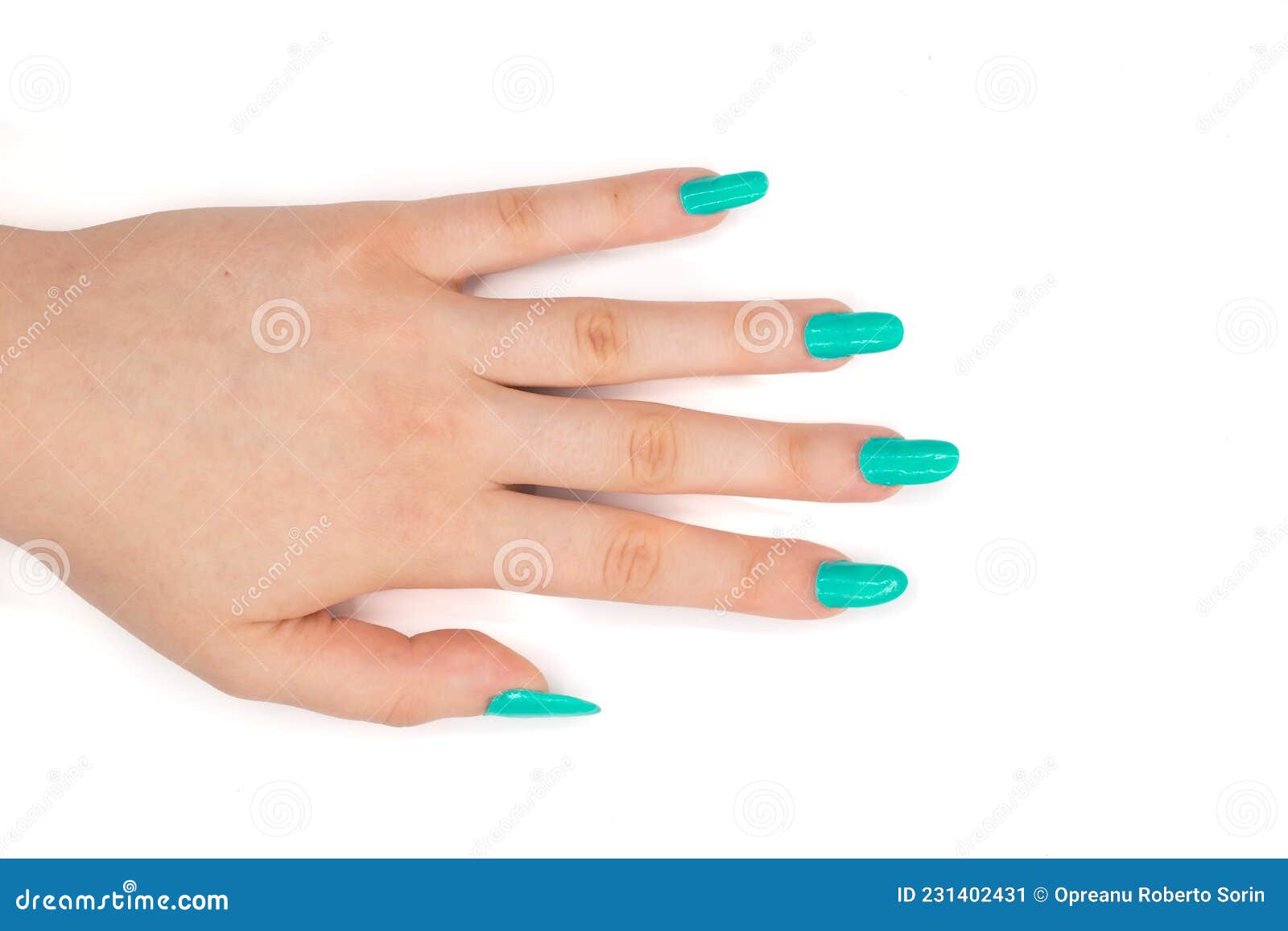 girls hand with nailart on white
