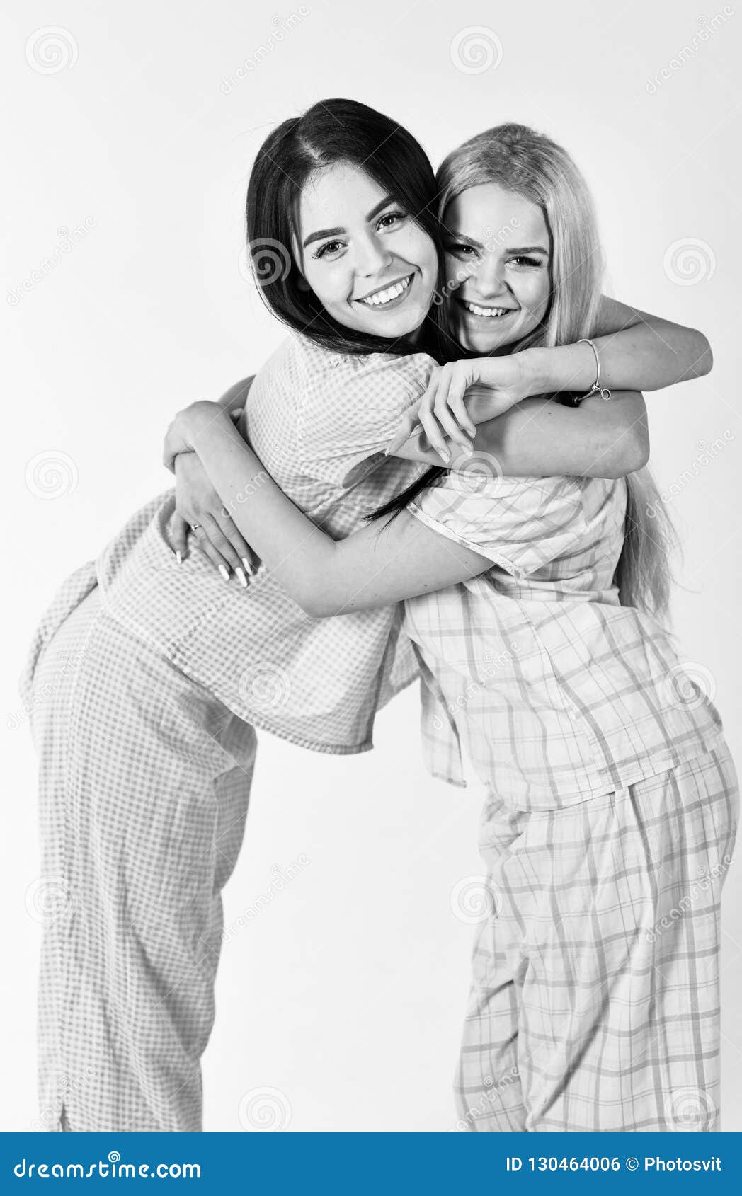 Girls Hugging Tight, Isolated on White Background. Sisters or Best ...