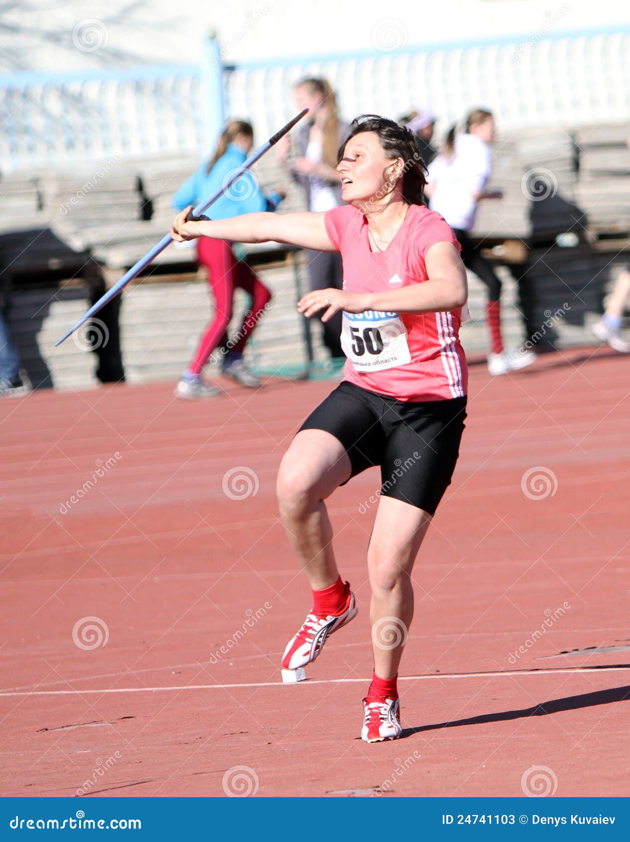 Girls on the javelin throw editorial stock photo. Image of