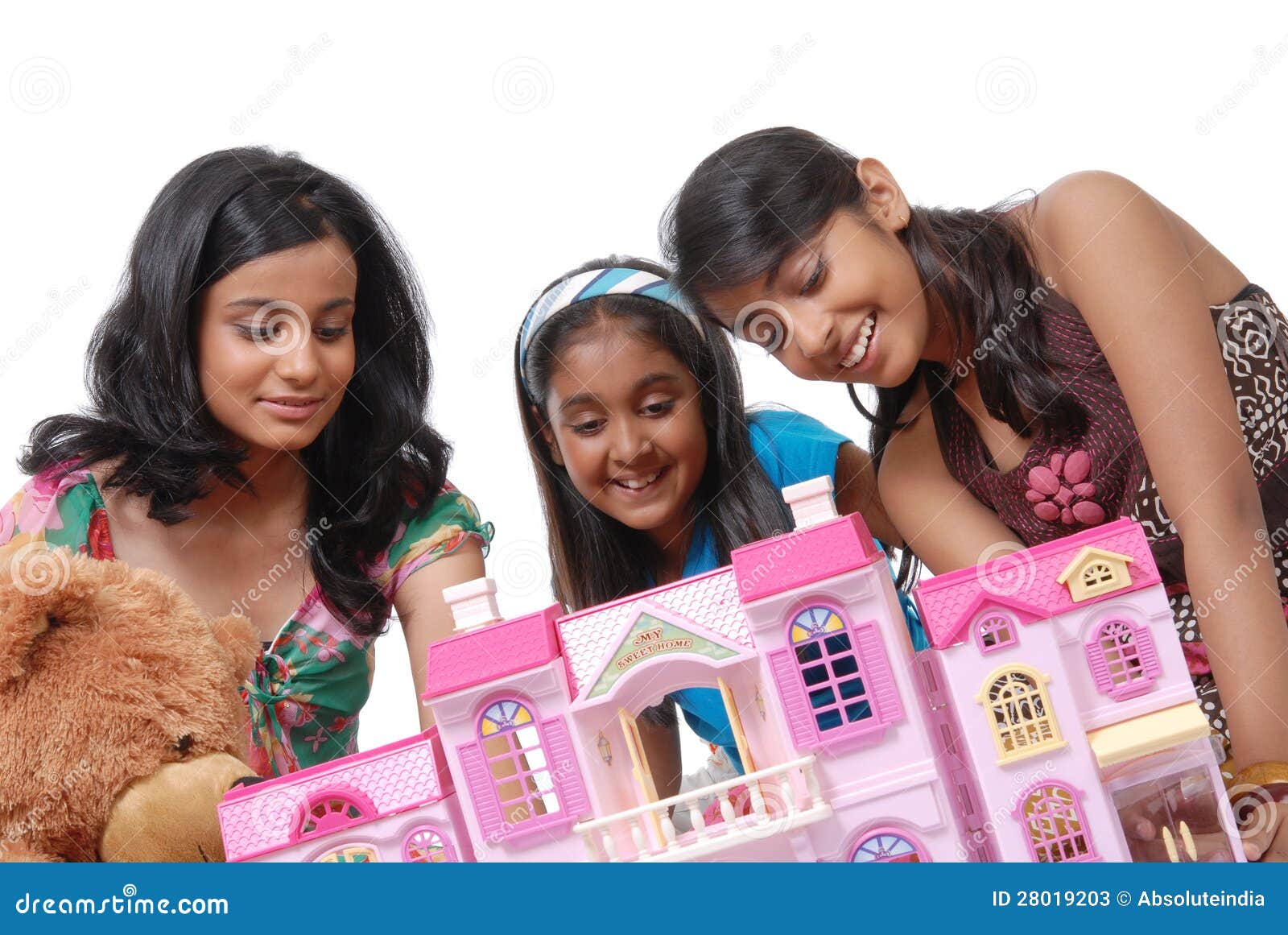 Girls Looking into a Dollhouse Stock Image Image of toys, teen 28019203
