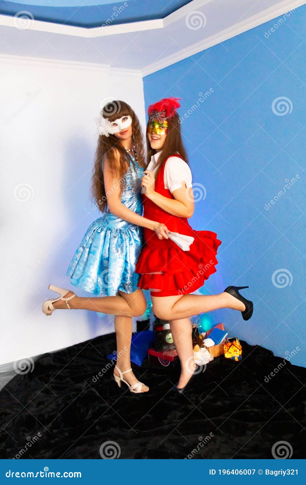 Girls in New Year`s Dresses Raised Their Legs To the Beat Stock Image ...