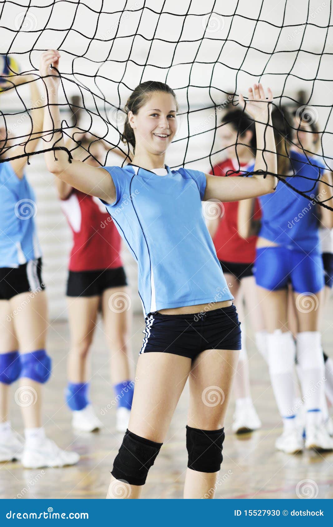 Girls playing volleyball indoor game — Stock Photo 