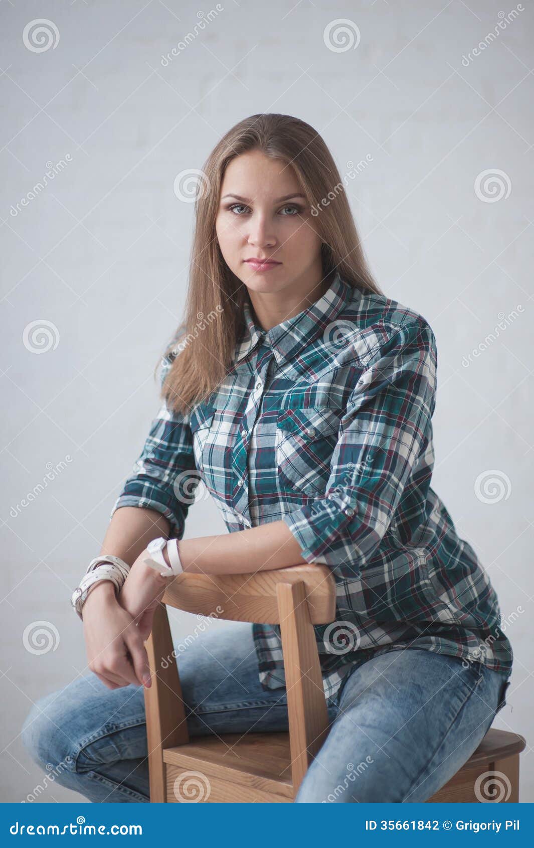 Full Length Portrait Girl Wearing Simple Blue Shirt Jeans Standing Stock  Photo by ©faestock 183068854