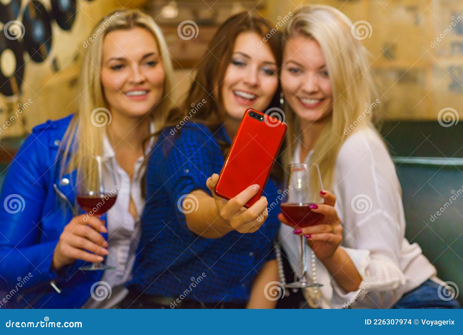 Girls in Pub Club Taking Self Photo with Phone Stock Photo - Image of ...