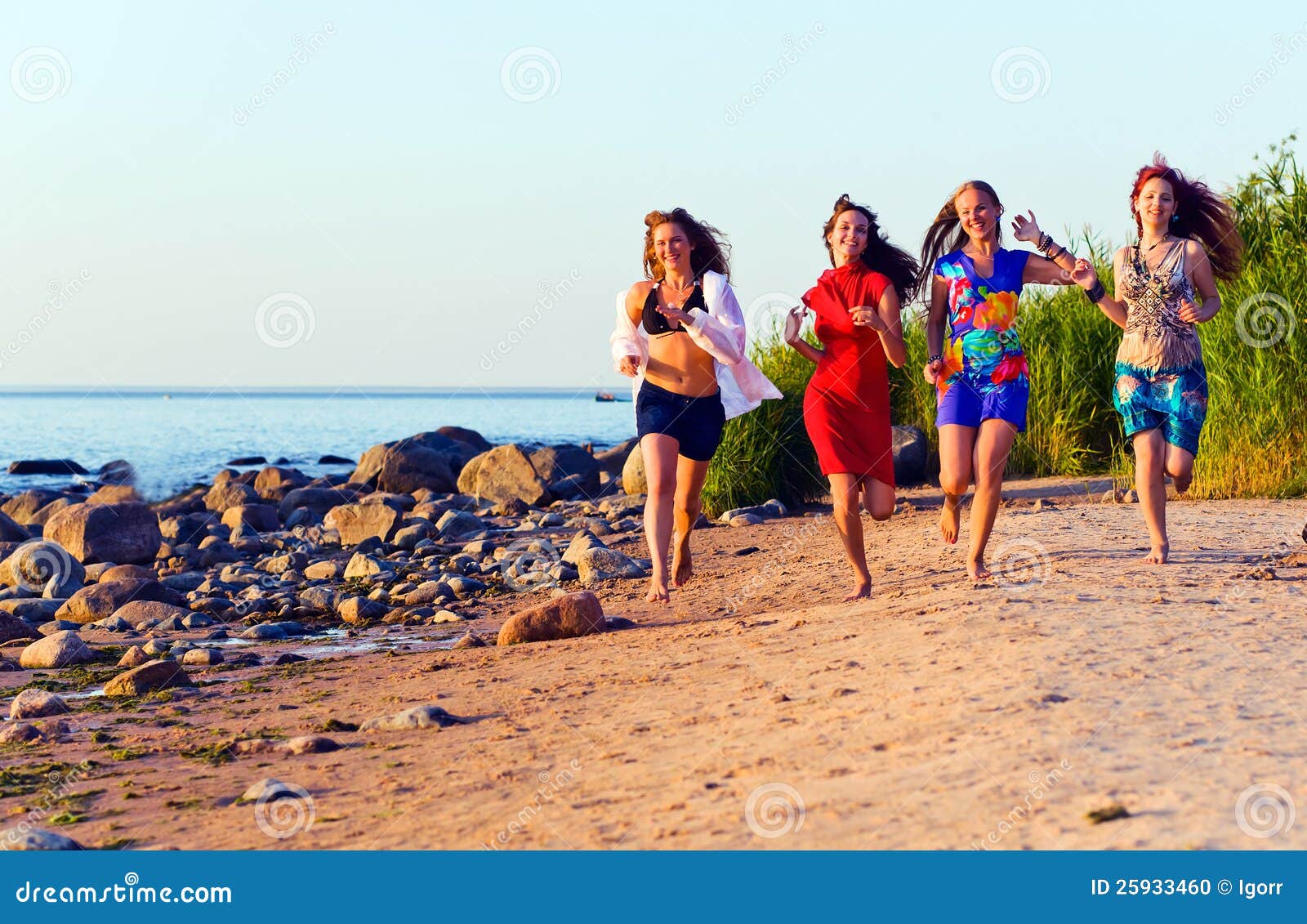 Girls on seacoast stock photo. Image of shore, leisure - 25933460