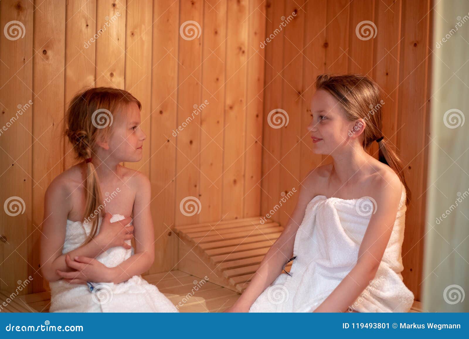 2 Girls Are Sitting In The Sauna And Looking At Each Other Stock Image Image Of Warmth Sister