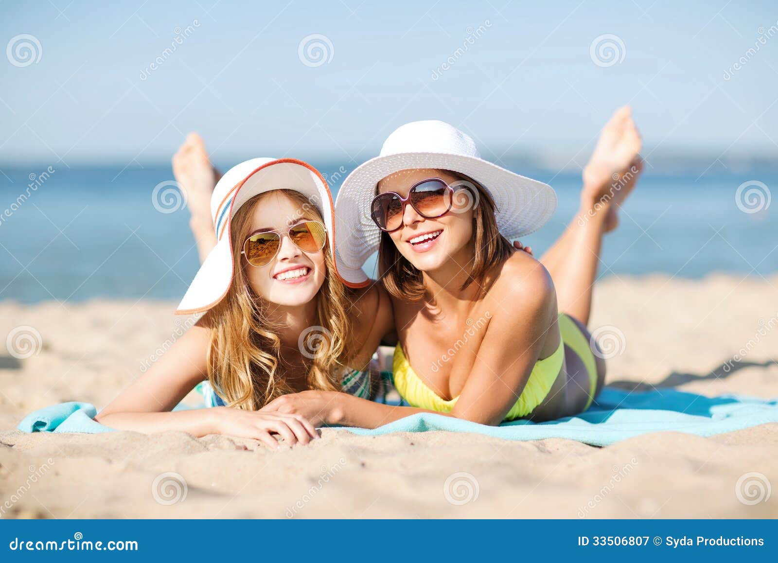 Girls Sunbathing On The Beach Stock Image Image 33506807