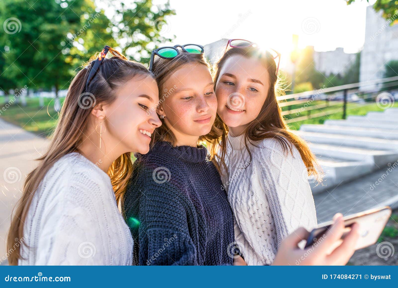 3 Girls Teenagers 12 13 14 Years, Summer Park, Holding Smartphone ...