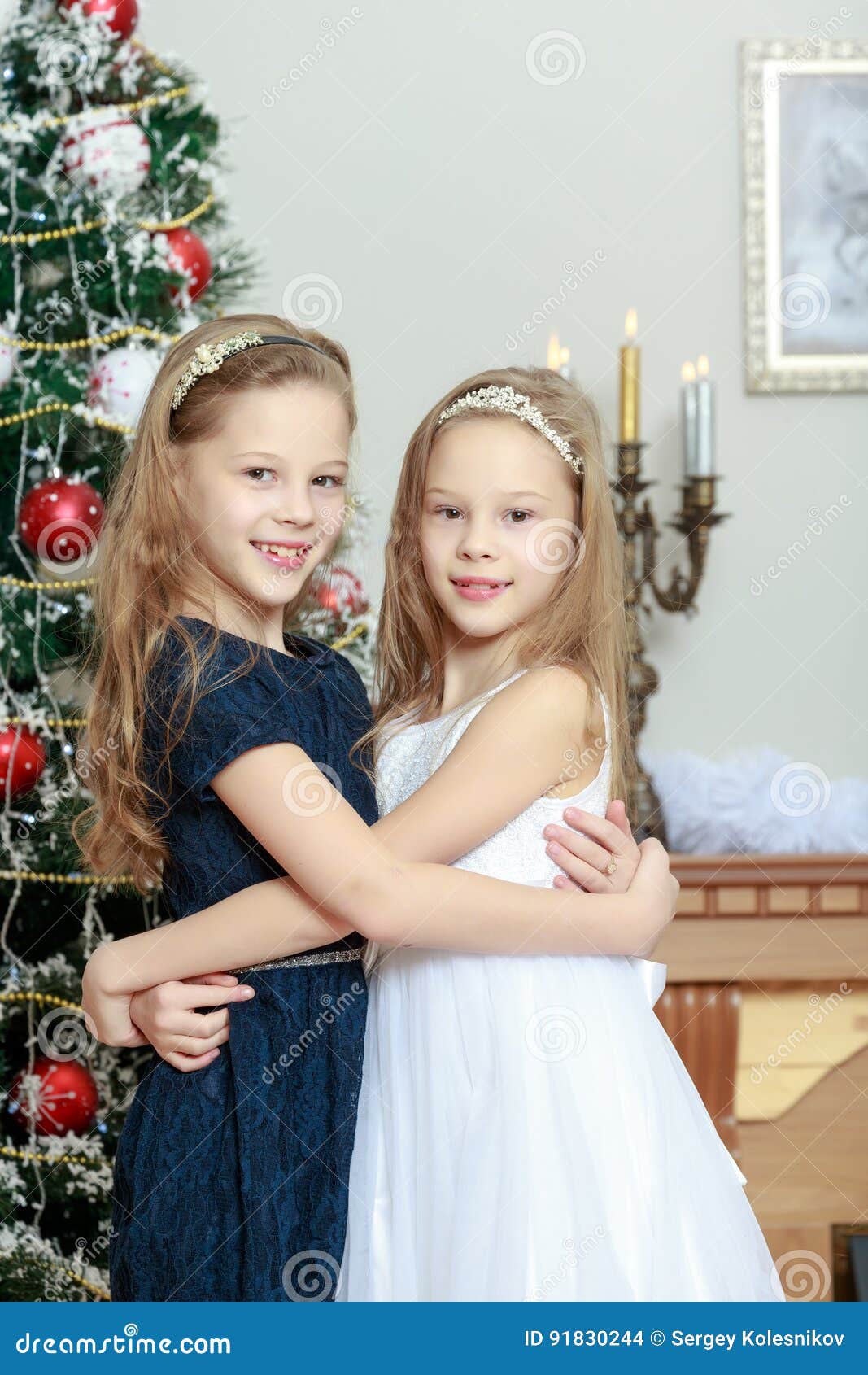 Girls Twins with Gifts E Christmas Tree. Stock Photo - Image of present ...