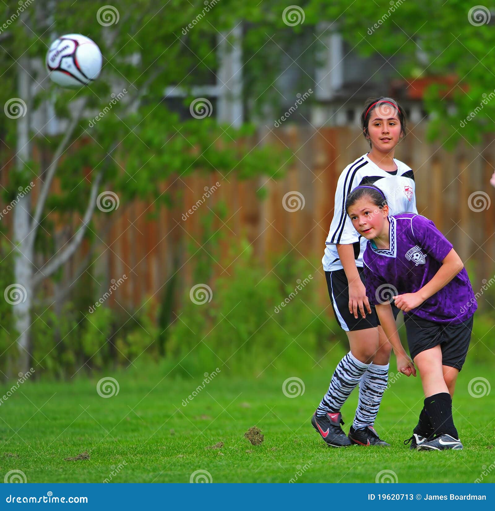 Girls Youth soccer kick editorial stock photo. Image of activities
