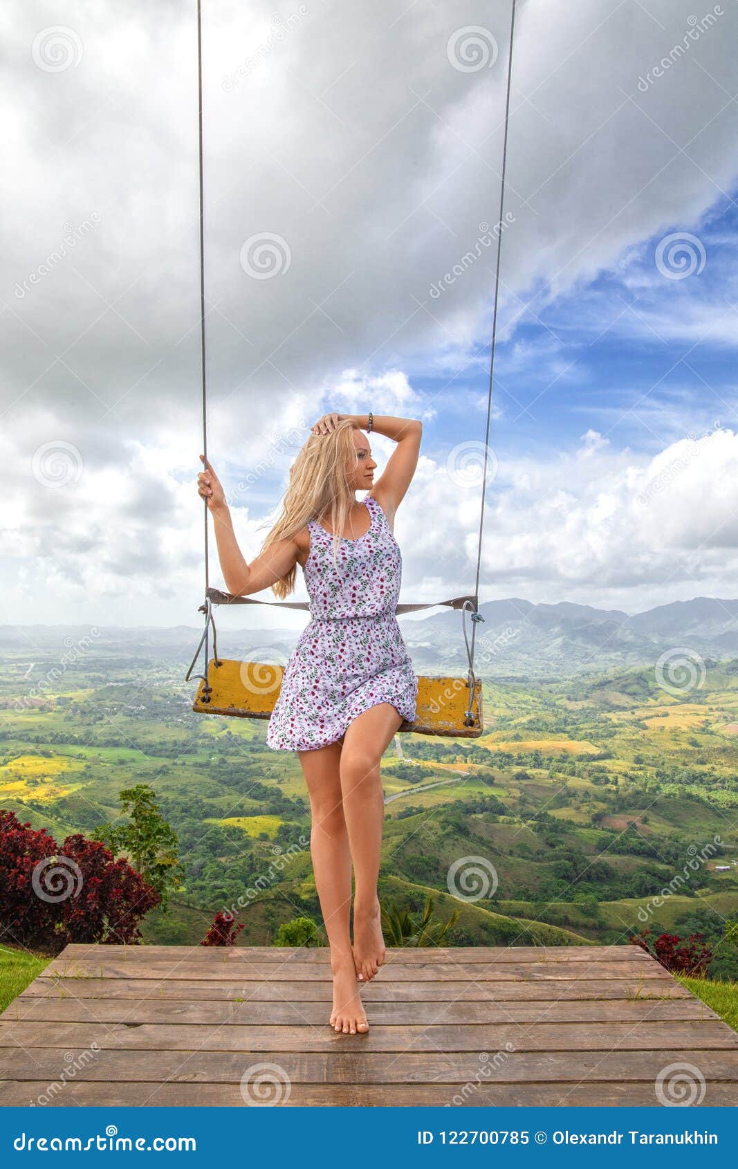 girs posing near swing on the redonda mountain