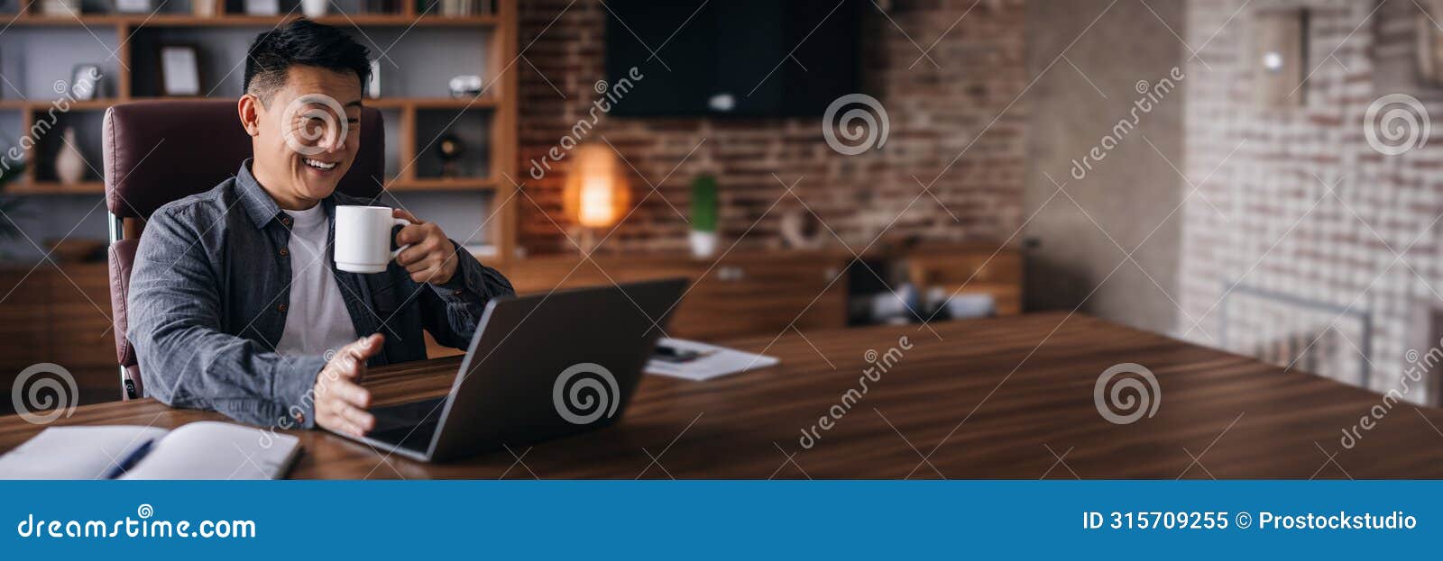 glad adult chinese man ceo manager work with laptop