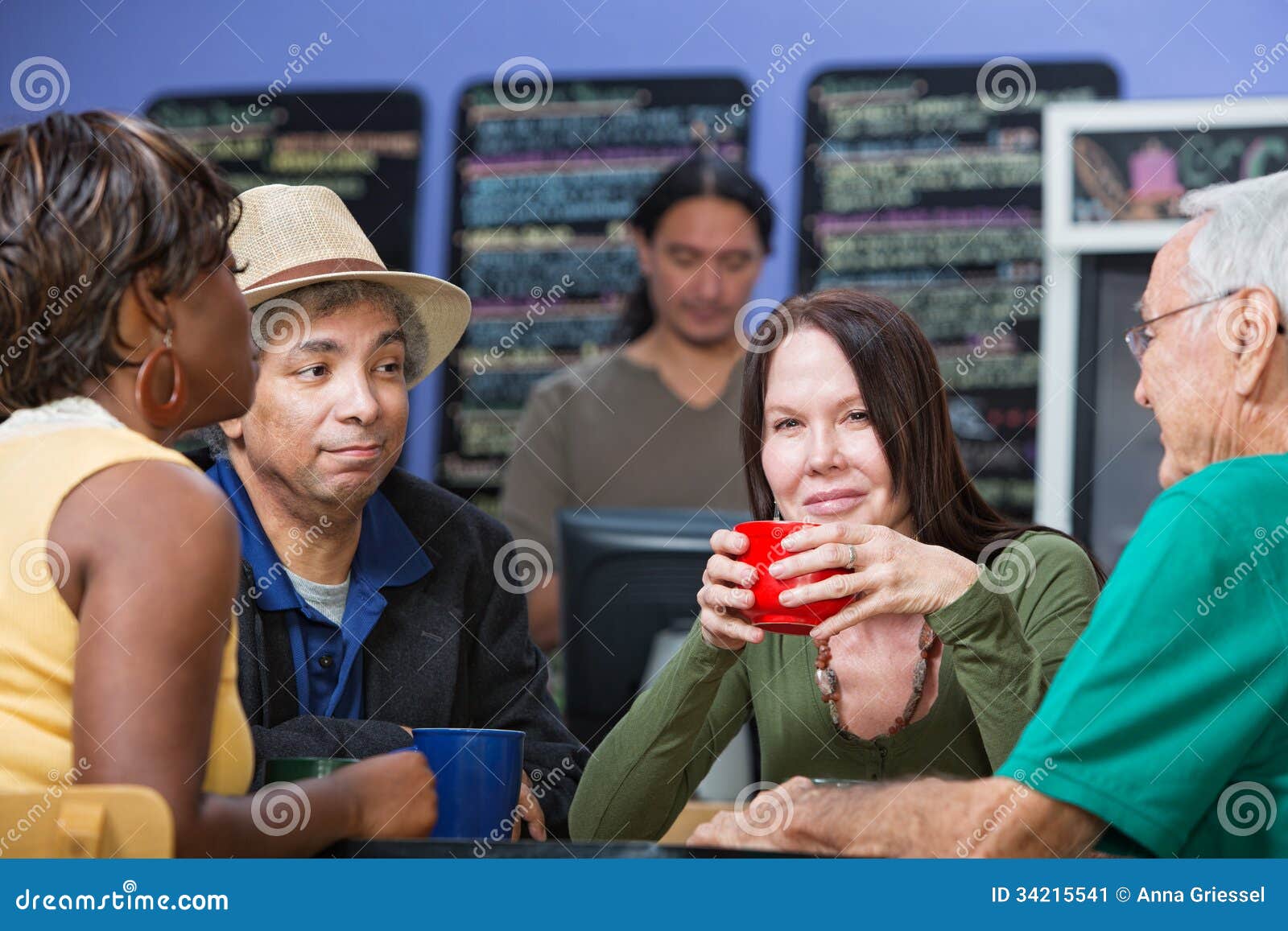 glad woman with friends in cafe