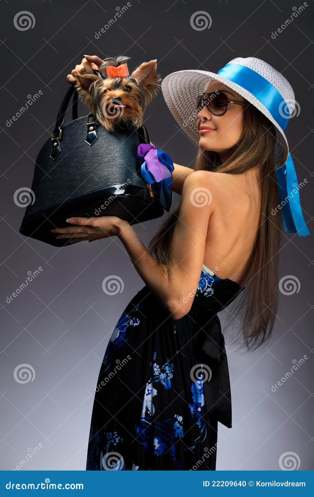glamor woman with yorkshire terrier